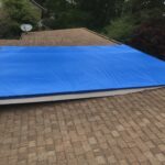 Emergency Roof repair- blue tarp installation in Huntsville, AL.