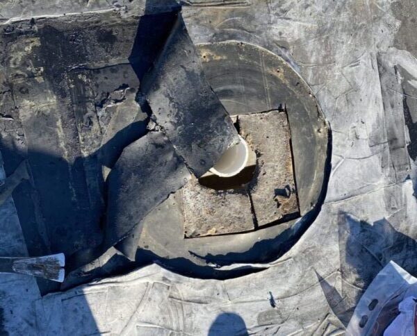 old black leaking edpm drain pipe