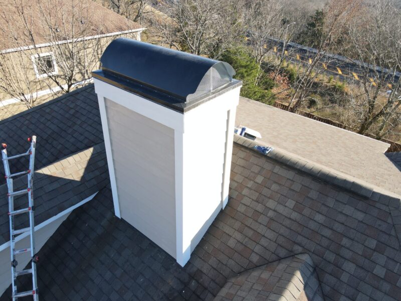 Chimney repair in Huntsville: new chimney chase cover installed to stop a leak